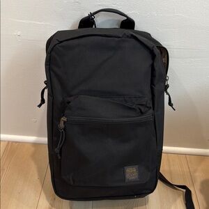 Filson Black Backpack with Durable Fabric and Padded Straps